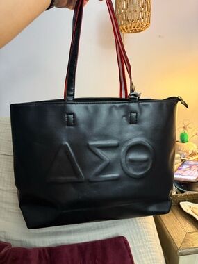 Delta Sigma Theta Embossed “Deltaline”Black Tote Bag